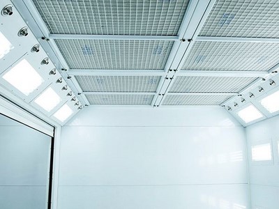 Ceiling mounted air acceleration system integrates light box, light fixtures and air duct, the blowers are mounted at ceiling plenum.